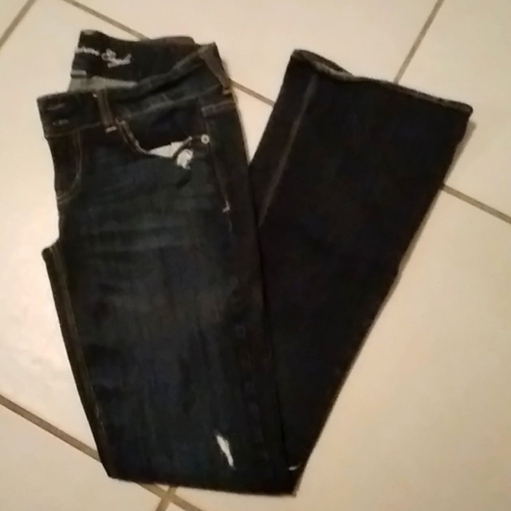 American Eagle Distressed Artist jeans. Size 4R. Dark wash.